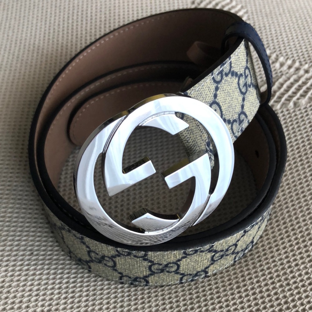 Gucci belt   Blue/beige, silver buckle.